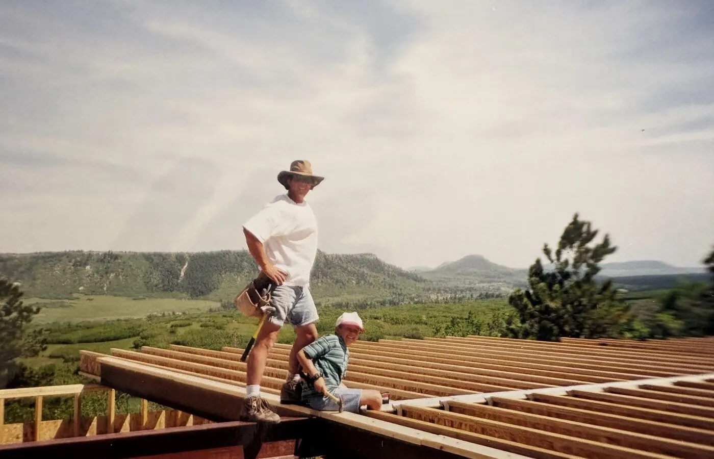 Framing a floor deck with mountains in the distance